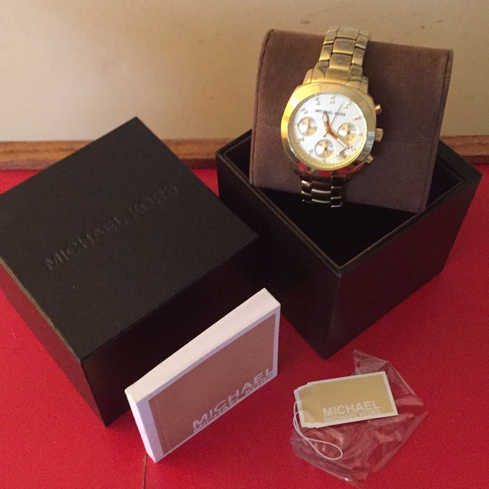 MK gold watch
